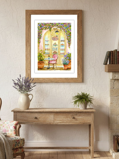 Fine art tisk Cukrárna v dřevěném rámu, vystavený v interiéru nad stolem s levandulí